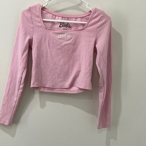 Forever 21 x Barbie™ collection, this ribbed,features a box neck, front Barbie